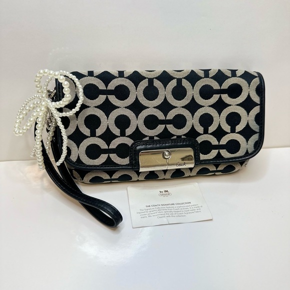 Coach Handbags - Coach Kristin Op Art Large Wristlet – Like New